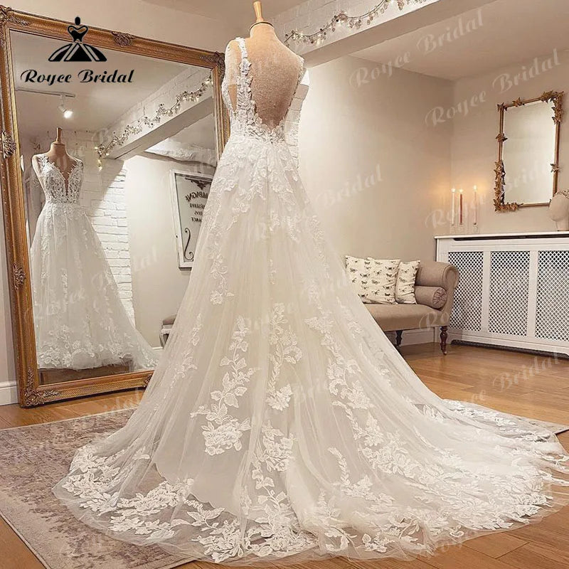 Robe de mariée sans manches à col en V, en dentelle. Robe dos nu Élégant