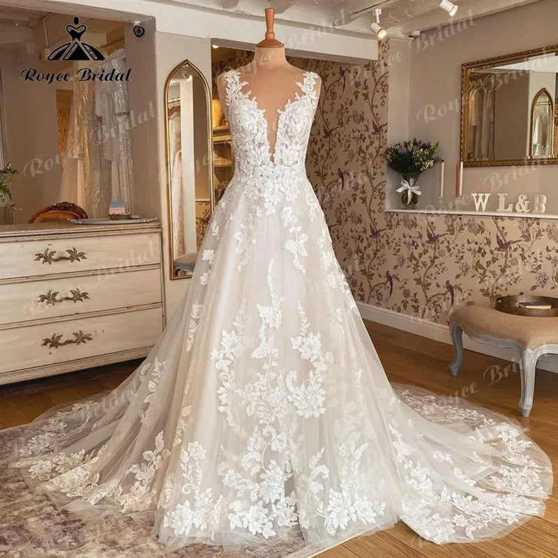 Robe de mariée sans manches à col en V, en dentelle. Robe dos nu Élégant